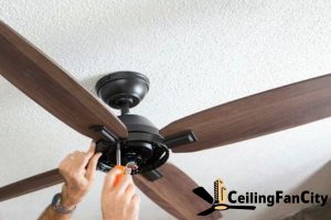 attach-the-fan-motor-and-bladesa-step-by-step-guide-to-diy-ceiling-fan-replacement-in-singapore-ceiling-fan-installation-and-replacement-ceiling-fan-city-singapore